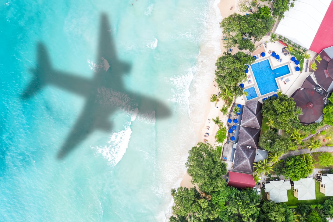 Symbolic picture vacation travel traveling luxury villa sea airplane flying Seychelles aerial photo beach